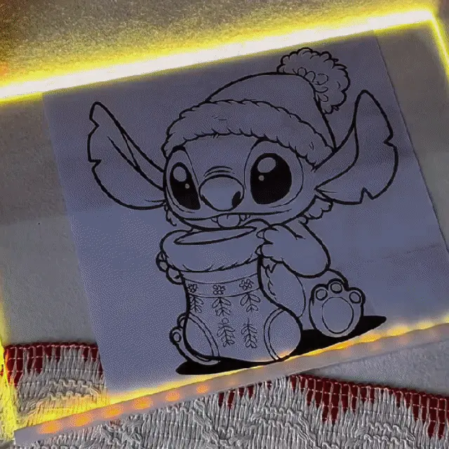 Kids creating vibrant glowing art on LED doodle board